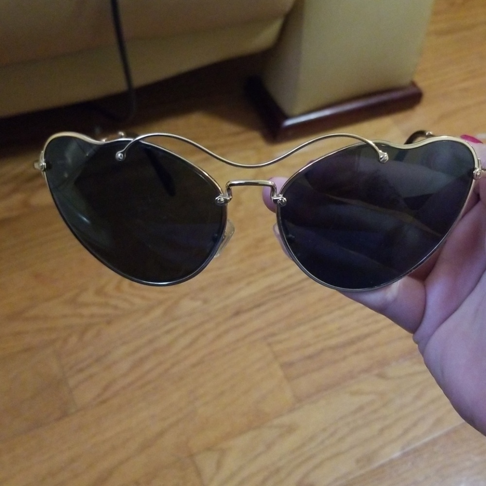 Miu Miu Smu 55r Sunglasses - image 1